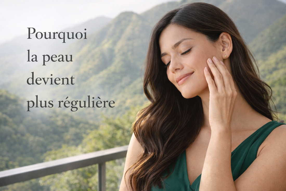 femme latino robe verte touchant sa joue peau plus reguliere evolution naturelle de la peau en lumiere naturelle